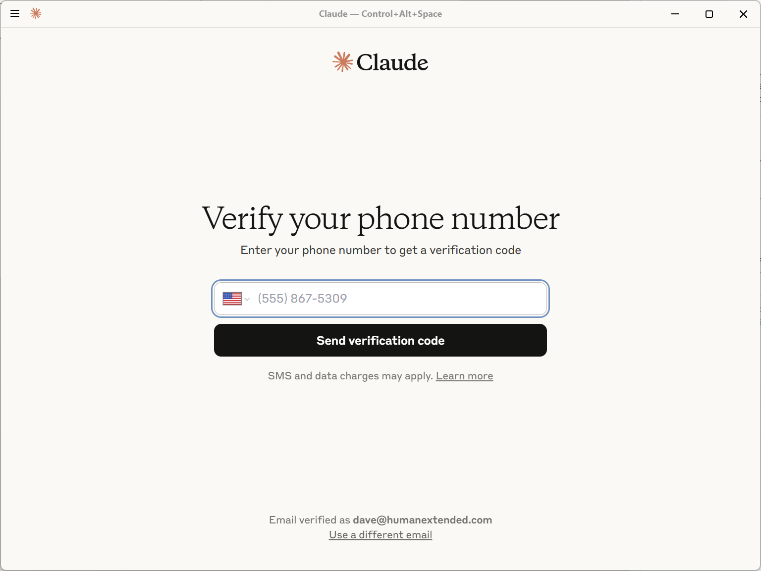 Screenshot of the Claude Desktop screen to enter and verify a phone number.